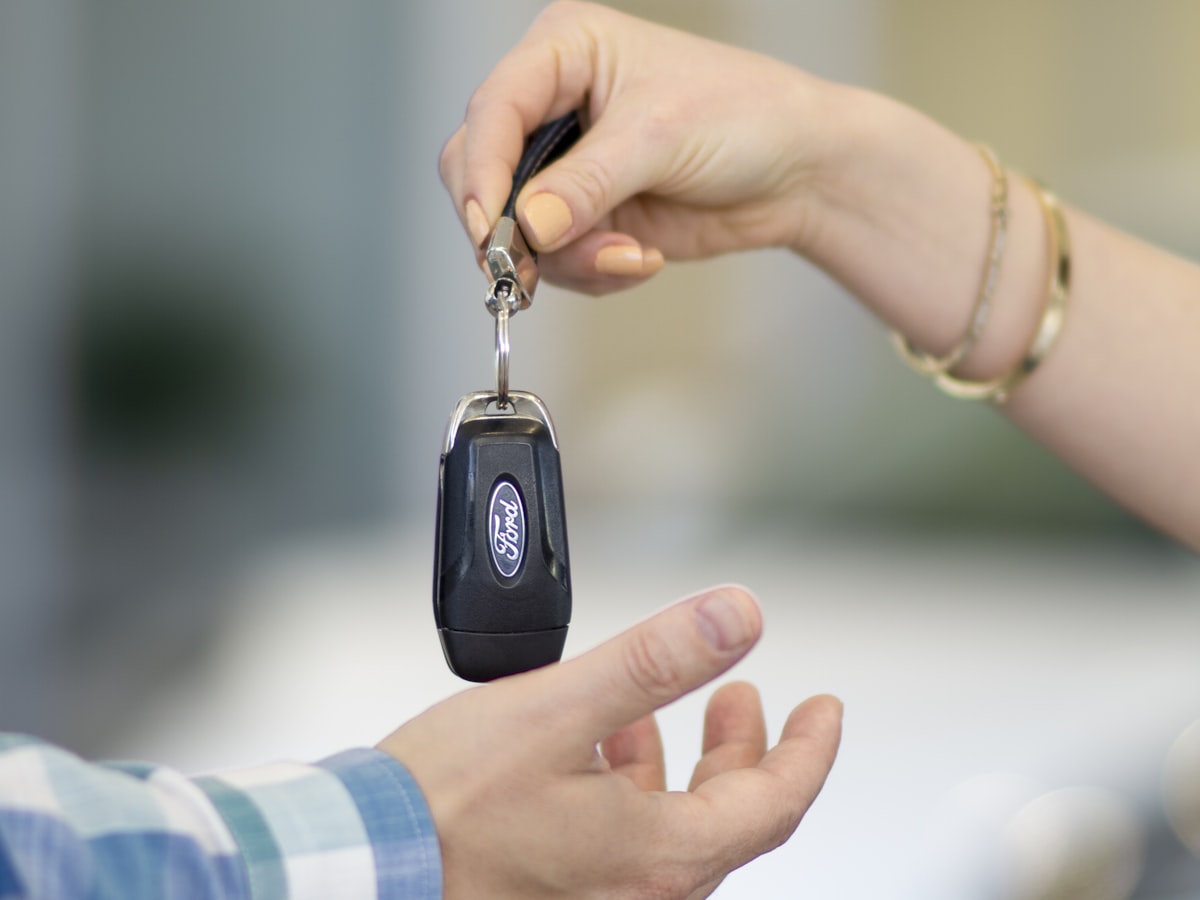 Handing over a car key
